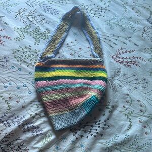 Homemade crocheted two pocket bag